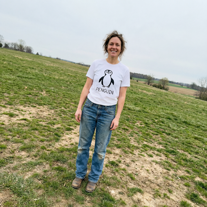 Penguin shirt worn outdoors – minimalist lofi penguin tee in natural setting