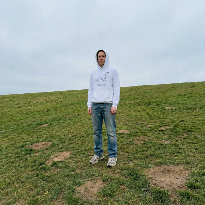 Worm hoodie worn outdoors – minimalist lofi worm hoodie in natural setting
