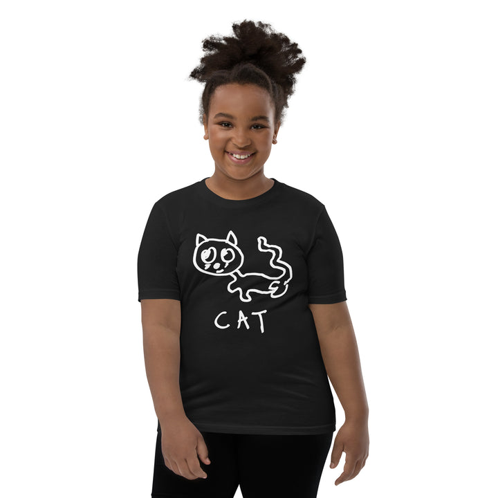 Child wearing a black t-shirt with a simple hand drawn cat illustration and &