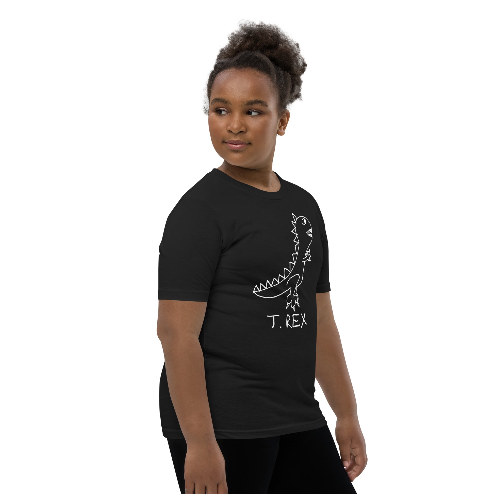 Confident girl wearing a black t-shirt with a  simple  hand drawn dinosaur graphic and 'T. Rex' text on a white background
